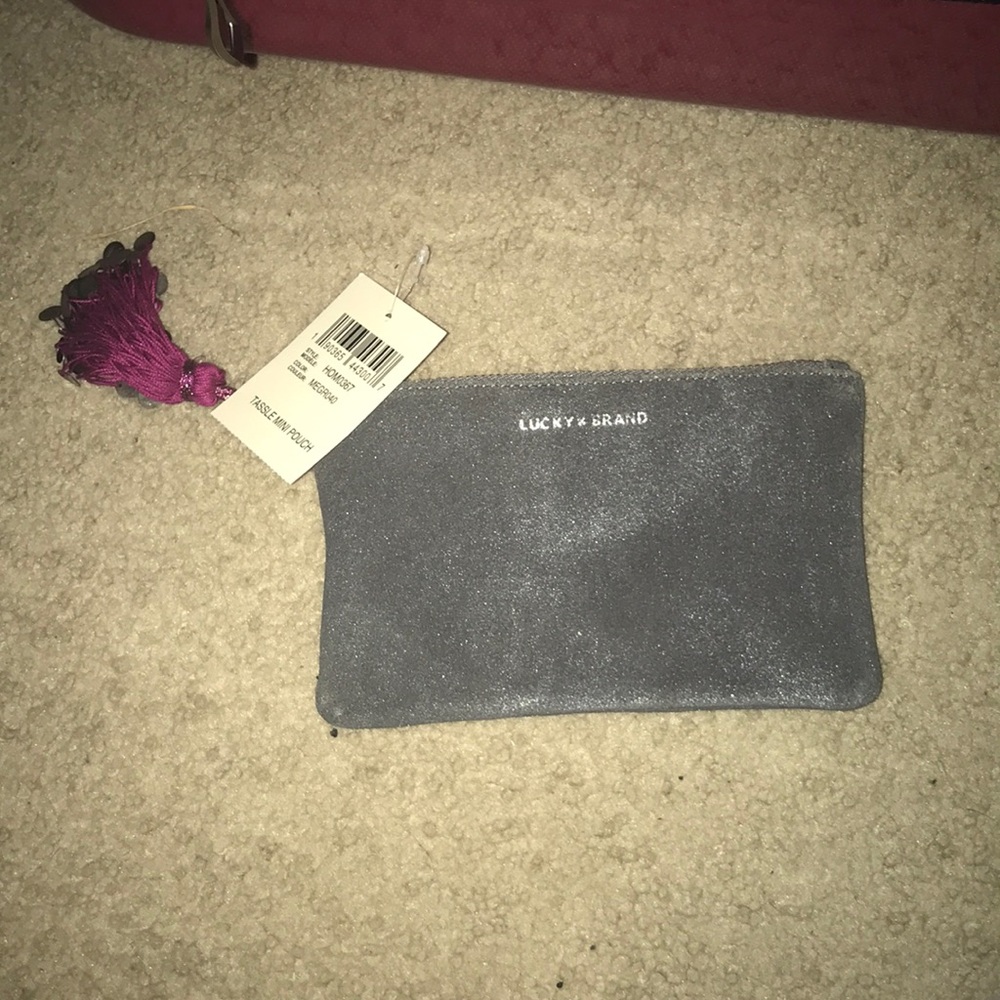 Lucky Brand Mini Tassle Pouch